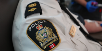 Man crashes into Winnipeg house after nearly hitting officers during escape